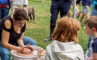 pottery demo by debra griffin's student at the ashland farmers market in Ashland, MA